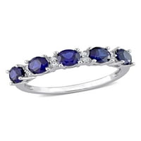 1- Carat T.G.W. Létrehozta a Blue Sapphire -t és létrehozta a fehér zafír ezüst évforduló gyűrűt